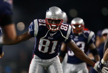 FOXBORO, MA - OCTOBER 20: Randy Moss #81 the New England Patriots celebrates a touchdown by teammate Sammy Morris #34 against the Denver Broncos at Gillette Stadium on October 20, 2008 in Foxboro, Massachusetts. (Photo by Jim Rogash/Getty Images)