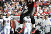 TAMPA, FL - NOVEMBER 16: Linebacker Derrick Brooks #55 of the Tampa Bay Buccaneers warms up with a leap against the Minnesota Vikings at Raymond James Stadium on November 16, 2008 in Tampa, Florida.  (Photo by Al Messerschmidt/Getty Images) 