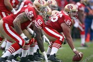 SAN FRANCISCO - DECEMBER 28:  Center Eric Heitmann #66 of the San Francisco 49ers gets ready to hike the ball during the game against the Washington Redskins at Candlestick Park on December 28, 2008 in San Francisco, California. (Photo by: Jonathan Ferrey/Getty Images)