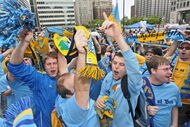 PHILADELPHIA - MAY 11: Fans cheer as the Philadelphia Union soccer team of the MLS release their name, colors and logo at a press conference on May 11, 2009 at City Hall in Philadelphia, Pennsylvania. (Photo by Drew Hallowell/Getty Images for Philadelphia Union)