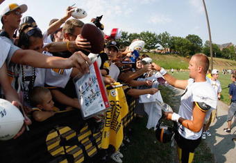 LATROBE, PENNSYLVANIA - JULY 28: Ben Roethlisberger #7 of the Pittsburgh Steelers signs autographs during training camp at St. Vincent College on July 28, 2007 in Latrobe, Pennsylvania. (Photo by: Gregory Shamus/Getty Images)