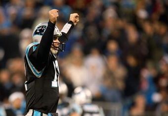 CHARLOTTE, NC - DECEMBER 14:  Jake Delhomme #17 of the Carolina Panthers reacts after the Panthers score a touchdown against the Denver Broncos during their game at Bank of America Stadium on December 14, 2008 in Charlotte, North Carolina  (Photo by Streeter Lecka/Getty Images)