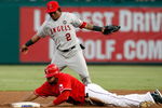 ARLINGTON, TX - JULY 1:  Nelson Cruz #17 of the Texas Rangers steals second base against Erick Aybar #2 of the Los Angeles Angels of Anaheim in the fourth inning at Rangers Ballpark July 1, 2009 in Arlington, Texas.  (Photo by Ronald Martinez/Getty Images)