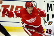 DETROIT - MAY 19:  Jiri Hudler #26 of the Detroit Red Wings celebrates after his teammate Mikael Samuelsson #37 scored the game-winning goal in overtime against the Chicago Blackhawks during Game Two of the Western Conference Championship Round of the 2009 Stanley Cup Playoffs on May 19, 2009 at Joe Louis Arena in Detroit, Michigan. The Red WIngs won 3-2 in overtime to take a 2-0 series lead.  (Photo by Claus Andersen/Getty Images)