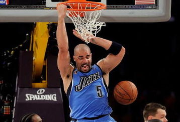 LOS ANGELES, CA - APRIL 19:  Carlos Boozer #5 of the Utah Jazz dunks the ball in the third quarter against the Los Angeles Lakers in Game One of the Western Conference Quarterfinals during the 2009 NBA Playoffs at Staples Center on April 19, 2009 in Los Angeles, California. NOTE TO USER: User expressly acknowledges and agrees that, by downloading and or using this photograph, User is consenting to the terms and conditions of the Getty Images License Agreement.  (Photo by Kevork Djansezian/Getty Images)