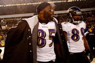 PITTSBURGH - JANUARY 18:  (L-R) Derrick Mason #85 and Mark Clayton #89 of the Baltimore Ravens stand on the field dejected after their 23-14 loss against the Pittsburgh Steelers during the AFC Championship game on January 18, 2009 at Heinz Field in Pittsburgh, Pennsylvania.  (Photo by Streeter Lecka/Getty Images)