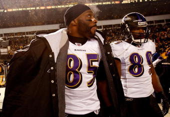 PITTSBURGH - JANUARY 18:  (L-R) Derrick Mason #85 and Mark Clayton #89 of the Baltimore Ravens stand on the field dejected after their 23-14 loss against the Pittsburgh Steelers during the AFC Championship game on January 18, 2009 at Heinz Field in Pittsburgh, Pennsylvania.  (Photo by Streeter Lecka/Getty Images)