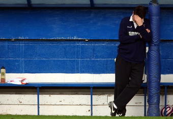 LUTON, ENGLAND - APRIL 13:  Luton Town manager Mick Harford holds his head during the Coca-Cola league two match between Luton Town and Chesterfield at Kenilworth Road on April 13, 2009 in Luton, England.  (Photo by Clive Rose/Getty Images)