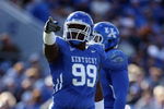LEXINGTON, KY - NOVEMBER 8:  Jeremy Jarmon #99 of the Kentucky Wildcats points during the game against the Georgia Bulldogs at Commonwealth Stadium on November 8, 2008 in Lexington, Kentucky. (Photo by Andy Lyons/Getty Images)