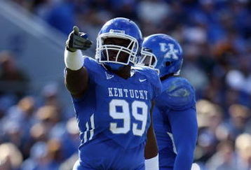 LEXINGTON, KY - NOVEMBER 8:  Jeremy Jarmon #99 of the Kentucky Wildcats points during the game against the Georgia Bulldogs at Commonwealth Stadium on November 8, 2008 in Lexington, Kentucky. (Photo by Andy Lyons/Getty Images)