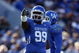 LEXINGTON, KY - NOVEMBER 8: Jeremy Jarmon #99 of the Kentucky Wildcats points during the game against the Georgia Bulldogs at Commonwealth Stadium on November 8, 2008 in Lexington, Kentucky. (Photo by Andy Lyons/Getty Images)