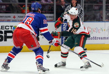 NEW YORK - MARCH 24:  Marian Gaborik #10 of the Minnesota Wild skates against Marc Staal #18 of the New York Rangers on March 24, 2009 at Madison Square Garden in New York City. The Rangers defeated the Wild 3-2.  (Photo by Jim McIsaac/Getty Images)