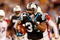 CHARLOTTE, NC - JANUARY 10:  Running back DeAngelo Williams #34 of the Carolina Panthers runs the ball against the Arizona Cardinals during the first quarter of the NFC Divisional Playoff Game on January 10, 2009 at Bank of America Stadium in Charlotte, North Carolina.  (Photo by Streeter Lecka/Getty Images)