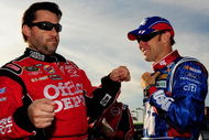 JOLIET, IL - JULY 11:  Tony Stewart (L), driver of the #14 Office Depot 'Back to School' Chevrolet, talks with Matt Kenseth, driver of the #17 USG Sheetrock Ford, prior to the start the NASCAR Sprint Cup Series LifeLock.com 400 at Chicagoland Speedway on July 11, 2009 in Joliet, Illinois.  (Photo by Rusty Jarrett/Getty Images for NASCAR)