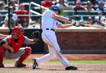 NEW YORK - JULY 12:  Daniel Murphy #28 of the New York Mets bats against the Cincinnati Reds on July 12, 2009 at Citi Field in the Flushing neighborhood of the Queens borough of New York City.  (Photo by Jim McIsaac/Getty Images)