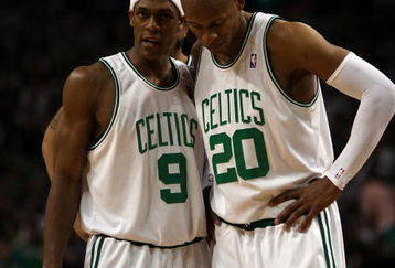 BOSTON - MAY 17:  Rajon Rondo #9 and Ray Allen #20 of the Boston Celtics talk as the Orlando Magic shoot a free throw in Game Seven of the Eastern Conference Semifinals during the 2009 NBA Playoffs at TD Banknorth Garden on May 17, 2009 in Boston, Massachusetts. The Orlando Magic defeated the Boston Celtics 101-82 to advance to the Eastern Conference Finals. NOTE TO USER: User expressly acknowledges and agrees that, by downloading and or using this photograph, User is consenting to the terms and conditions of the Getty Images License Agreement.  (Photo by Elsa/Getty Images)