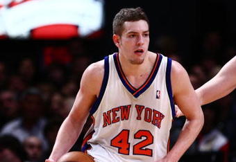 NEW YORK - JANUARY 23:  David Lee #42 of the New York Knicks dribbles the ball upcourt during the game against the Memphis Grizzlies at Madison Square Garden January 23, 2009 in New York City. NOTE TO USER: User expressly acknowledges and agrees that, by downloading and/or using this Photograph, User is consenting to the terms and conditions of the Getty Images License Agreement. The Knicks defeated the Grizzlies 108-88. (Photo by Chris McGrath/Getty Images)