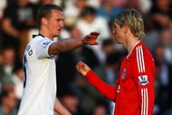 LONDON, ENGLAND - APRIL 04: Fernando Torres of Liverpool and Brede Hangeland of Fulham exchange words during the Barclays Premier League match between Fulham and Liverpool at Craven Cottage on April 4, 2009 in London, England. (Photo by Ryan Pierse/Getty Images)