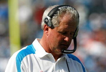 CHARLOTTE, NC - OCTOBER 05:  Head coach John Fox of the Carolina Panthers looks at the playbook during the game against the Kansas City Chiefs at Bank of America on October 5, 2008 in Charlotte, North Carolina.  (Photo by Kevin C. Cox/Getty Images)