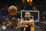 ORLANDO, FL - JUNE 14:  Derek Fisher #2 of the Los Angeles Lakers makes a pass against the Orlando Magic in Game Five of the 2009 NBA Finals on June 14, 2009 at Amway Arena in Orlando, Florida. The Lakers won 99-86. NOTE TO USER:  User expressly acknowledges and agrees that, by downloading and or using this photograph, User is consenting to the terms and conditions of the Getty Images License Agreement. (Photo by Elsa/Getty Images) 