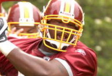 ASHBURN, VA - MAY 1:  Albert Haynesworth #92 of the Washington Redskins runs through drills during minicamp on May 1, 2009 at Redskins Park in Ashurn, Virginia.   (Photo by Mitchell Layton/Getty Images)