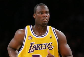 LOS ANGELES, CA - DECEMBER 30:   Kwame Brown #54 of the Los Angeles Lakers runs upcourt during the game against the Boston Celtics at Staples Center on December 30, 2007 in Los Angeles, California.  NOTE TO USER: User expressly acknowledges and agrees that, by downloading and or using this Photograph, user is consenting to the terms and conditions of the Getty Images License Agreement.  (Photo by Lisa Blumenfeld/Getty Images)