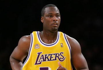 LOS ANGELES, CA - DECEMBER 30:   Kwame Brown #54 of the Los Angeles Lakers runs upcourt during the game against the Boston Celtics at Staples Center on December 30, 2007 in Los Angeles, California.  NOTE TO USER: User expressly acknowledges and agrees that, by downloading and or using this Photograph, user is consenting to the terms and conditions of the Getty Images License Agreement.  (Photo by Lisa Blumenfeld/Getty Images)