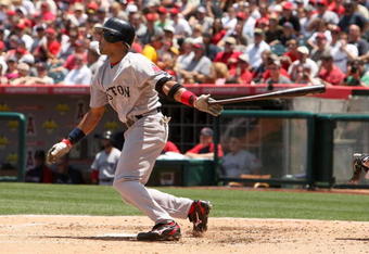 ANAHEIM, CA - MAY 14:  Shortstop Julio Lugo #23 of the Boston Red Sox bats against the Los Angeles Angels of Anaheim on May 14, 2009 at Angel Stadium in Anaheim, California.   The Angels won 5-4 in 12 innings.  (Photo by Stephen Dunn/Getty Images)