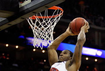 KANSAS CITY, MO - MARCH 19:  Trevor Booker #35 of the Clemson Tigers jumps to the basket for the slam dunk against the Michigan Wolverines during the first round of the NCAA Division I Men's Basketball Tournament at the Sprint Center on March 19, 2009 in Kansas City, Missouri.  The Wolverines defeated the Tigers 62-59.  (Photo by Jamie Squire/Getty Images)