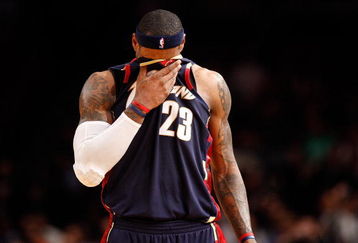 NEW YORK - FEBRUARY 04:  LeBron James #23 of the Cleveland Cavaliers wipes sweat from his face against the New York Knicks on February 4, 2009 at Madison Square Garden in New York City. NOTE TO USER: User expressly acknowledges and agrees that, by downloading and or using this photograph, User is consenting to the terms and conditions of the Getty Images License Agreement.  (Photo by Nick Laham/Getty Images)
