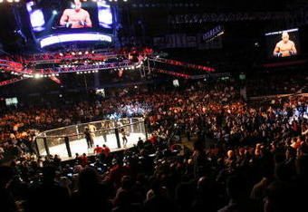 CHICAGO- OCTOBER 25:  People attend the UFC 90 at UFC's Ultimate Fight Night at Allstate Arena on October 25, 2008 in Chicago, Illinois. (Photo by Tasos Katopodis/Getty Images)