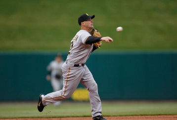 ST. LOUIS - APRIL 6:  Jack Wilson #2 of the Pittsburgh Pirates throws against the St. Louis Cardinals during Opening Day on April 6, 2009 at Busch Stadium in St. Louis, Missouri.  The Pirates beat the Cardinals 6-4. (Photo by Dilip Vishwanat/Getty Images)  