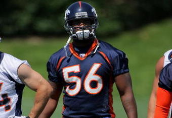 ENGLEWOOD, CO - JUNE 12:  First round draft pick linebacker Robert Ayers #56 of the Denver Broncos participates in minicamp practice at the Broncos Dove Valley training facility on June 12, 2009 in Englewood, Colorado.  (Photo by Doug Pensinger/Getty Images)