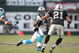 OAKLAND - NOVEMBER 9: DeAngelo Williams #34 of the Carolina Panthers carries the ball against Nnamdi Asomugha #21 of the Oakland Raiders at the Oakland-Alameda County Coliseum on November 9, 2008 in Oakland, California. (Photo by: Jed Jacobsohn/Getty Images)