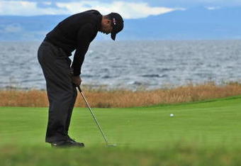 TURNBERRY, SCOTLAND - JULY 17:  Tiger Woods of USA reacts to a missed putt during round two of the 138th Open Championship on the Ailsa Course, Turnberry Golf Club on July 17, 2009 in Turnberry, Scotland.  (Photo by Stuart Franklin/Getty Images)