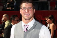 LOS ANGELES, CA - JULY 15:  Football player Tim Tebow arrives at the 2009 ESPY Awards held at Nokia Theatre LA Live on July 15, 2009 in Los Angeles, California. The 17th annual ESPYs will air on Sunday, July 19 at 9PM ET on ESPN.  (Photo by Jason Merritt/Getty Images)