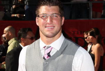 LOS ANGELES, CA - JULY 15:  Football player Tim Tebow arrives at the 2009 ESPY Awards held at Nokia Theatre LA Live on July 15, 2009 in Los Angeles, California. The 17th annual ESPYs will air on Sunday, July 19 at 9PM ET on ESPN.  (Photo by Jason Merritt/Getty Images)