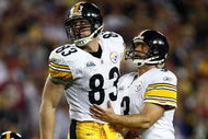 TAMPA, FL - FEBRUARY 01:  Tight end Heath Miller #83 of the Pittsburgh Steelers runs into kicker Jeff Reed #3 against the Arizona Cardinals during Super Bowl XLIII on February 1, 2009 at Raymond James Stadium in Tampa, Florida.  (Photo by Chris McGrath/Getty Images)