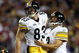 TAMPA, FL - FEBRUARY 01: Tight end Heath Miller #83 of the Pittsburgh Steelers runs into kicker Jeff Reed #3 against the Arizona Cardinals during Super Bowl XLIII on February 1, 2009 at Raymond James Stadium in Tampa, Florida. (Photo by Chris McGrath/Getty Images)