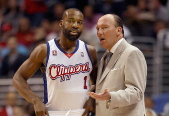 LOS ANGELES - NOVEMBER 17:  Baron Davis #1 and head coach Mike Dunleavy of the Los Angeles Clippers talk on the sideline during the game against the San Antonio Spurs on November 17, 2008 at Staples Center in Los Angeles, California. The Spurs won 86-83. NOTE TO USER: User expressly acknowledges and agrees that, by downloading and/or using this Photograph, user is consenting to the terms and conditions of the Getty Images License Agreement. (Photo by Jeff Gross/Getty Images)