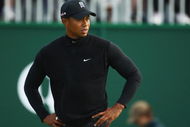 TURNBERRY, SCOTLAND - JULY 17: Tiger Woods of USA leaves the 18th green during round two of the 138th Open Championship on the Ailsa Course, Turnberry Golf Club on July 17, 2009 in Turnberry, Scotland. (Photo by Richard Heathcote/Getty Images)