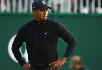 TURNBERRY, SCOTLAND - JULY 17:  Tiger Woods of USA leaves the 18th green during round two of the 138th Open Championship on the Ailsa Course, Turnberry Golf Club on July 17, 2009 in Turnberry, Scotland.  (Photo by Richard Heathcote/Getty Images)