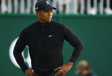 TURNBERRY, SCOTLAND - JULY 17:  Tiger Woods of USA leaves the 18th green during round two of the 138th Open Championship on the Ailsa Course, Turnberry Golf Club on July 17, 2009 in Turnberry, Scotland.  (Photo by Richard Heathcote/Getty Images)