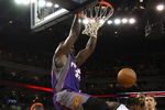 OAKLAND, CA - MARCH 15:  Shaquille O'Neal #32 of the Phoenix Suns dunks over Kelenna Azubuike #7 of the Golden State Warriors during an NBA game on March 15, 2009 at Oracle Arena in Oakland, California. NOTE TO USER: User expressly acknowledges and agrees that, by downloading and or using this photograph, User is consenting to the terms and conditions of the Getty Images License Agreement.  (Photo by Jed Jacobsohn/Getty Images)