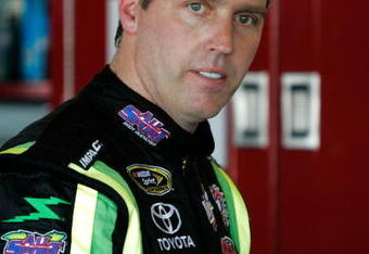 TALLADEGA, AL - APRIL 24:  Jeremy Mayfield, driver of the #41 All Sport Body Quencher Toyota, waits in the garage area during practice for the NASCAR Sprint Cup Series Aaron's 499 at Talladega Superspeedway on April 24, 2009 in Talladega, Alabama.  (Photo by Jerry Markland/Getty Images for NASCAR)