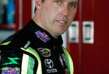 TALLADEGA, AL - APRIL 24:  Jeremy Mayfield, driver of the #41 All Sport Body Quencher Toyota, waits in the garage area during practice for the NASCAR Sprint Cup Series Aaron's 499 at Talladega Superspeedway on April 24, 2009 in Talladega, Alabama.  (Photo by Jerry Markland/Getty Images for NASCAR)