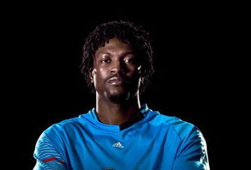 UNDATED - UNSPECIFIED:   In this handout image provided by adidas, Emmanuel Adebayor of Arsenal and Togo with his new adidas F50i football boots and training kit.  (Photo by Getty Images for adidas)