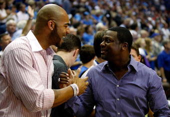 ORLANDO, FL - JUNE 11:  Carlos Boozer of the Utah Jazz greets actor Chris Tucker before Game Four of the 2009 NBA Finals between the Los Angeles Lakers and the Orlando Magic on June 11, 2009 at Amway Arena in Orlando, Florida.  NOTE TO USER:  User expressly acknowledges and agrees that, by downloading and or using this photograph, User is consenting to the terms and conditions of the Getty Images License Agreement.  (Photo by Chris Graythen/Getty Images)