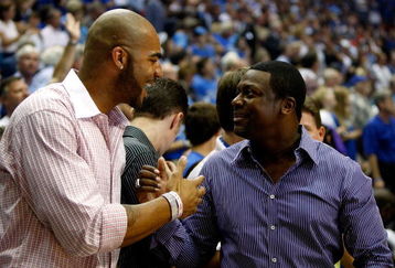 ORLANDO, FL - JUNE 11:  Carlos Boozer of the Utah Jazz greets actor Chris Tucker before Game Four of the 2009 NBA Finals between the Los Angeles Lakers and the Orlando Magic on June 11, 2009 at Amway Arena in Orlando, Florida.  NOTE TO USER:  User expressly acknowledges and agrees that, by downloading and or using this photograph, User is consenting to the terms and conditions of the Getty Images License Agreement.  (Photo by Chris Graythen/Getty Images)