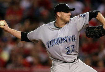 ANAHEIM, CA - MAY 6:  Roy Halladay #32 of the Toronto Blue Jays throws a pitch against the Los Angeles Angels of Anaheim at Angel Stadium May 6, 2009 in Anaheim, California.  (Photo by Stephen Dunn/Getty Images)